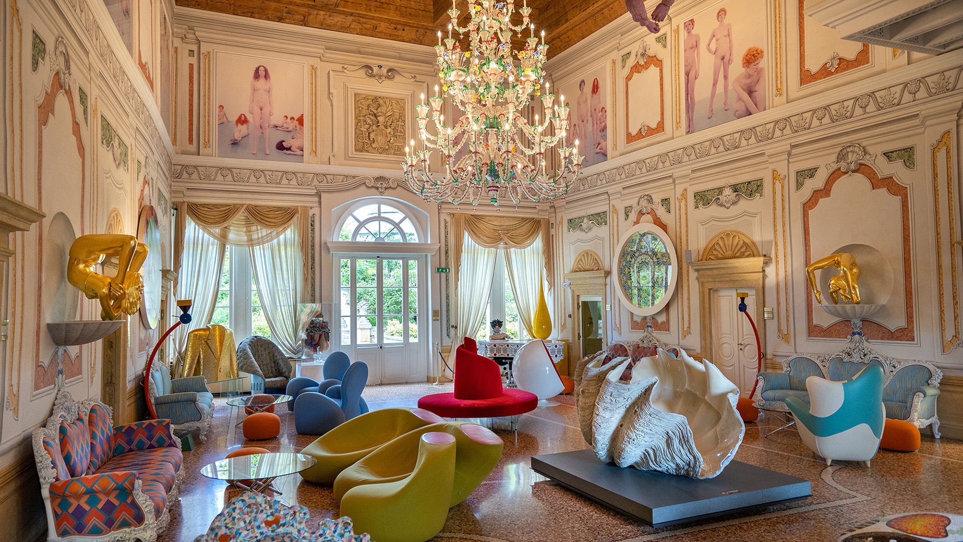 Main hall of the Byblos Art Hotel with art installations and iconic designer furniture