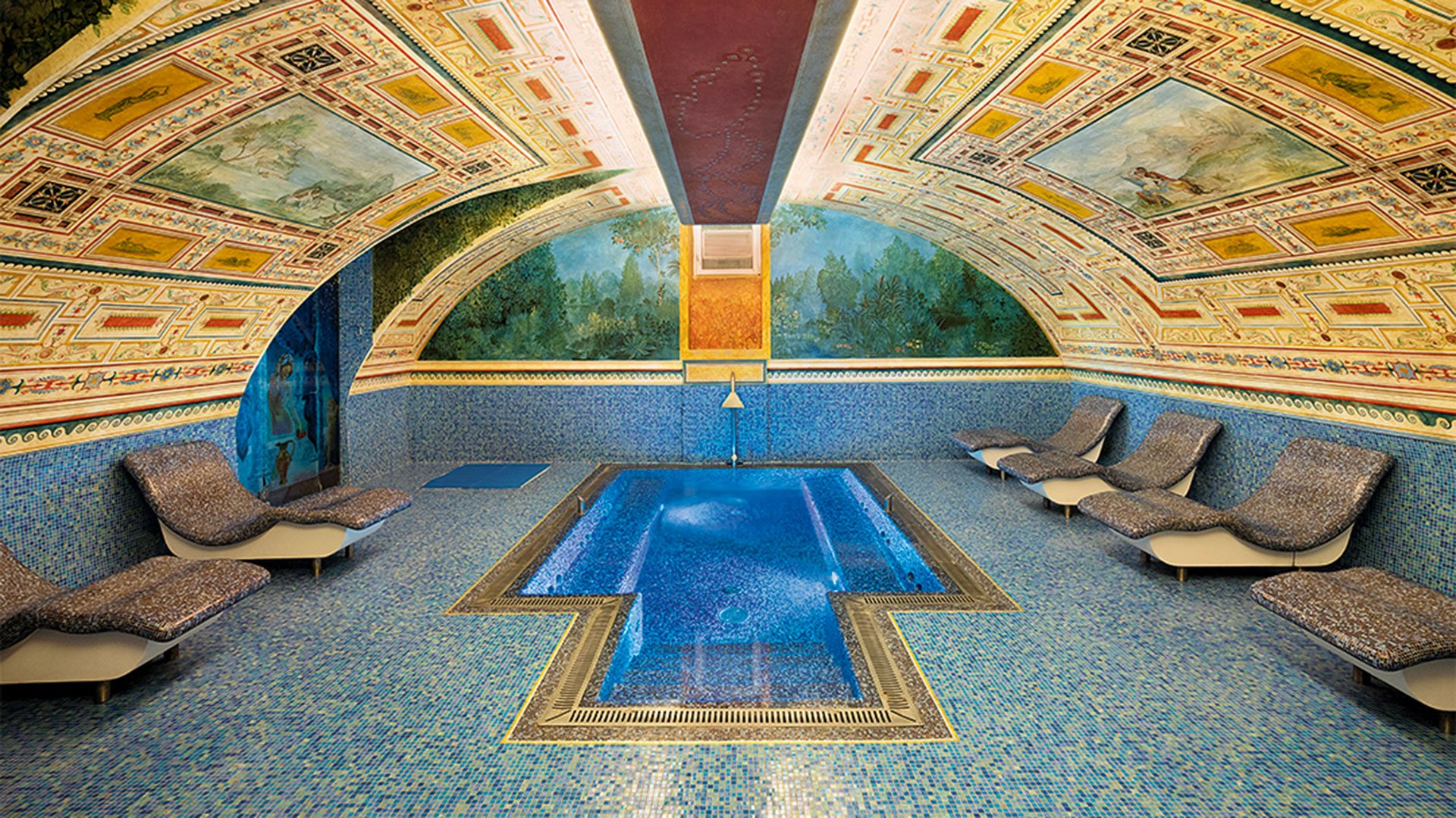 Indoor pool with frescoes and mosaics in the Wellness & SPA Byblos