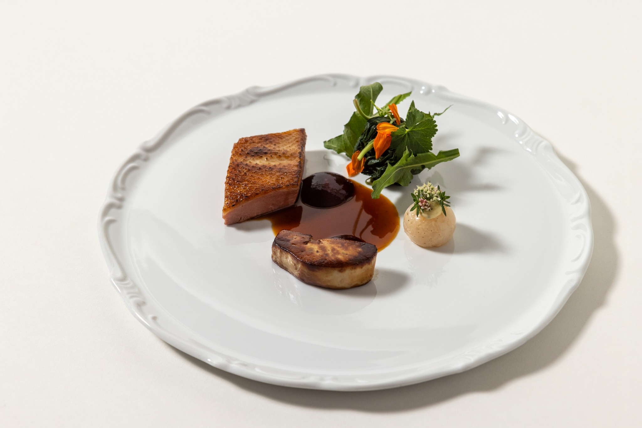 Duck, langoustine, foie gras, cherries and dandelion