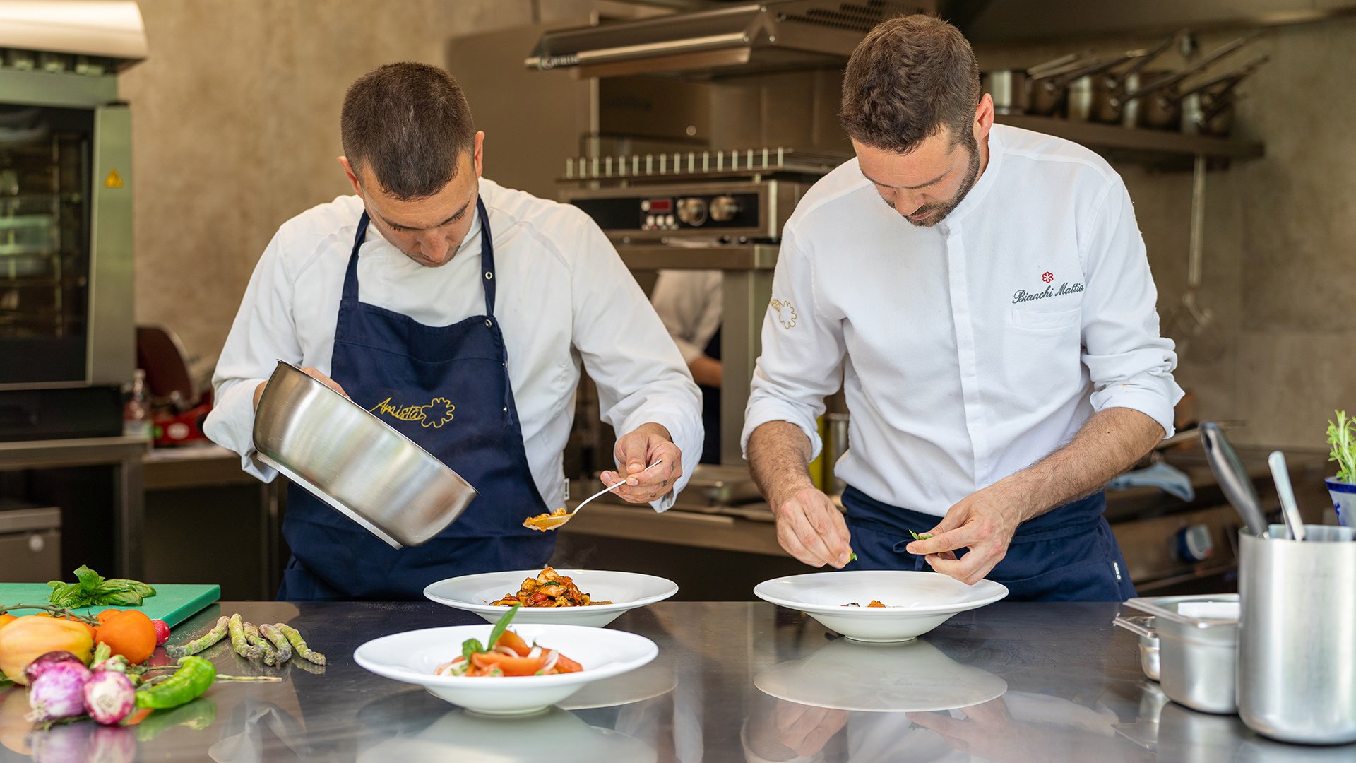 Chefs at work in the kitchen of Saor restaurant